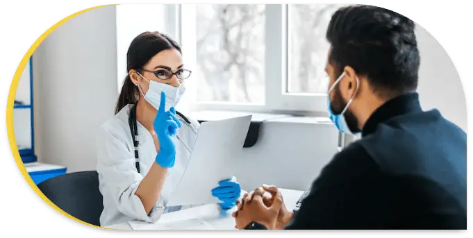 A healthcare professional discussing about hair transplant with a patient.